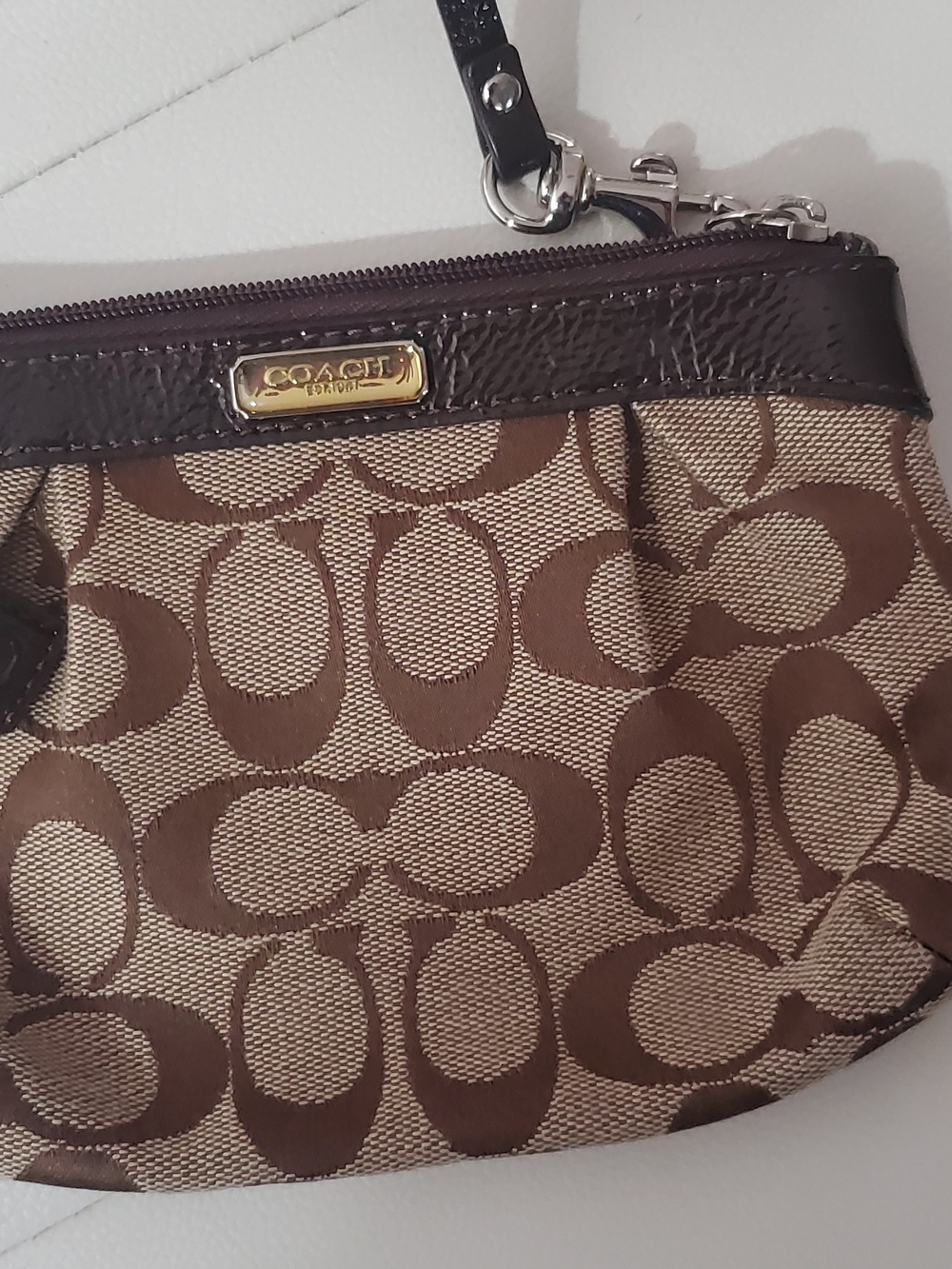 COACH Brown Signature Canvas Wristlet with Leather Trim